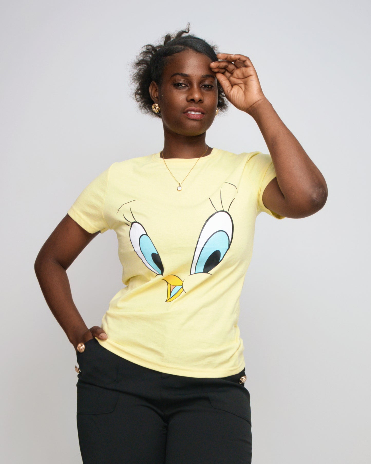 T-SHIRT FEMENINA COM  MODELO OLHOS DO PATINHO  (KK35053)