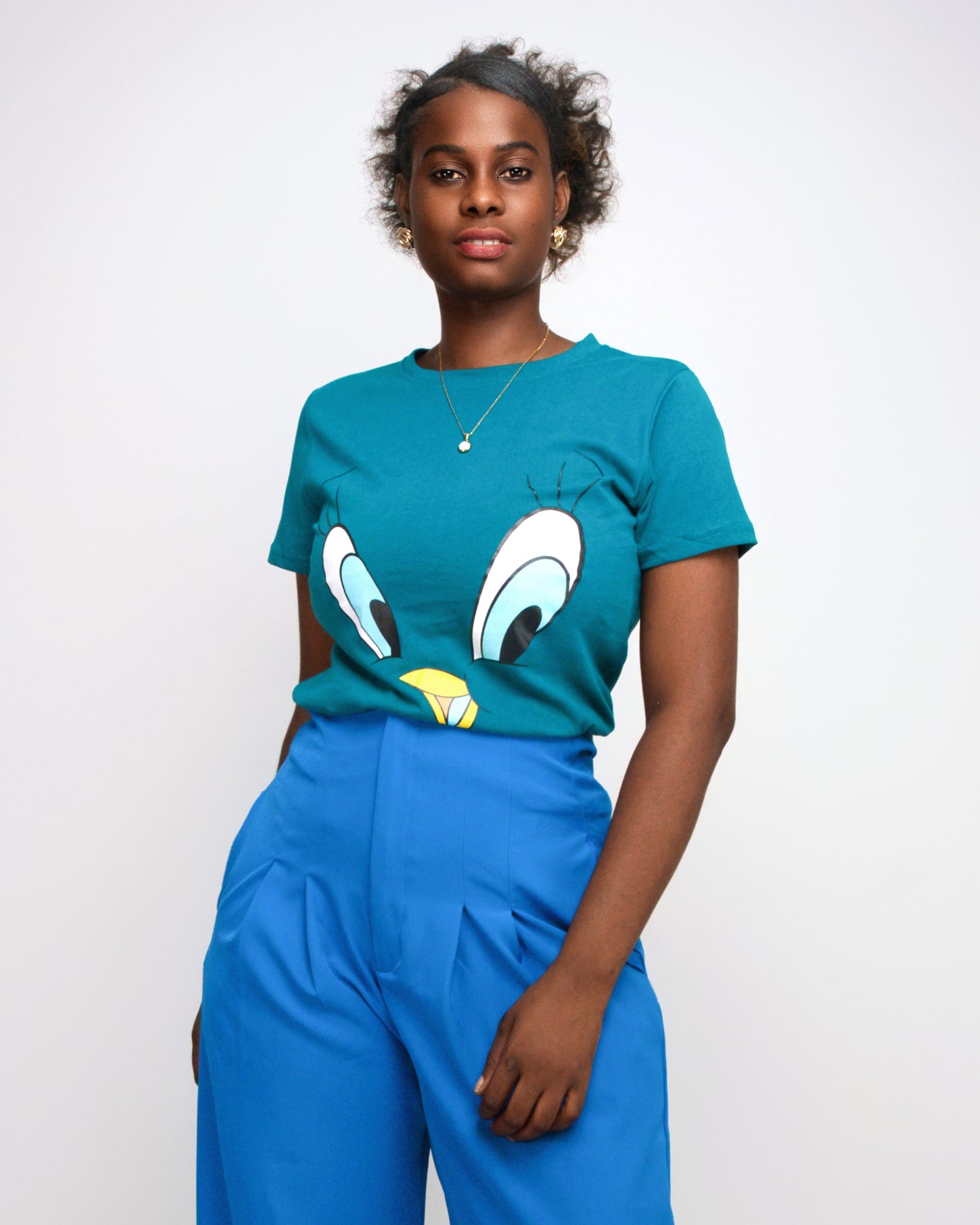 T-SHIRT FEMENINA COM  MODELO OLHOS DO PATINHO  (KK35053)